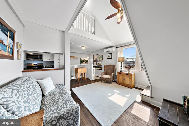 living room featuring ceiling fan, high vaulted ceiling, and hardwood / wood-style flooring