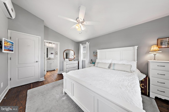 bedroom featuring dark hardwood / wood-style flooring, an AC wall unit, lofted ceiling, and ceiling fan