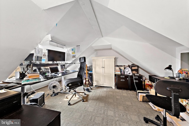 office area featuring carpet flooring and lofted ceiling