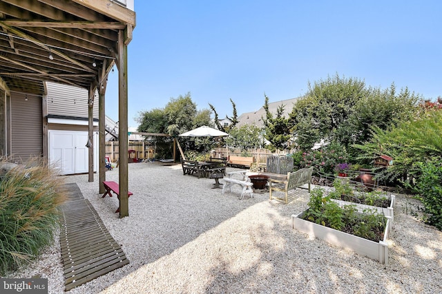 view of patio / terrace with a fire pit