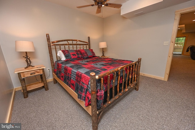 carpeted bedroom featuring a ceiling fan and baseboards