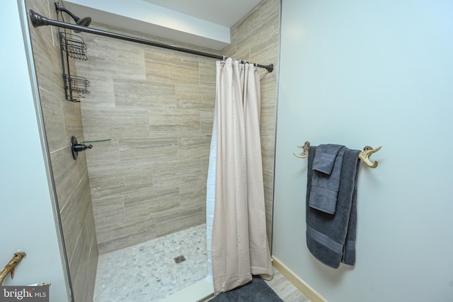 bathroom featuring a stall shower