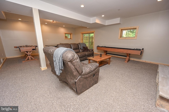 carpeted living room with recessed lighting and baseboards