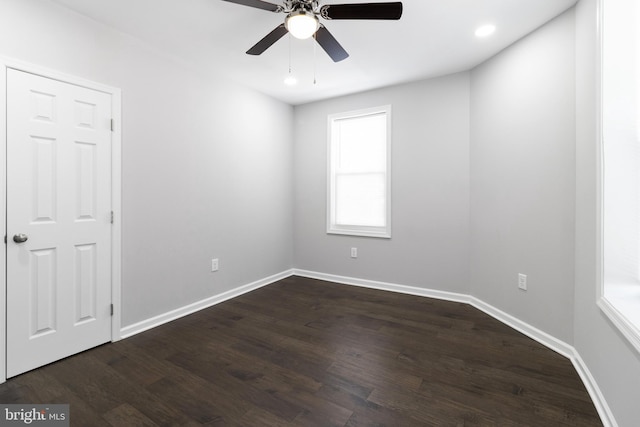 spare room featuring ceiling fan and wood-type flooring