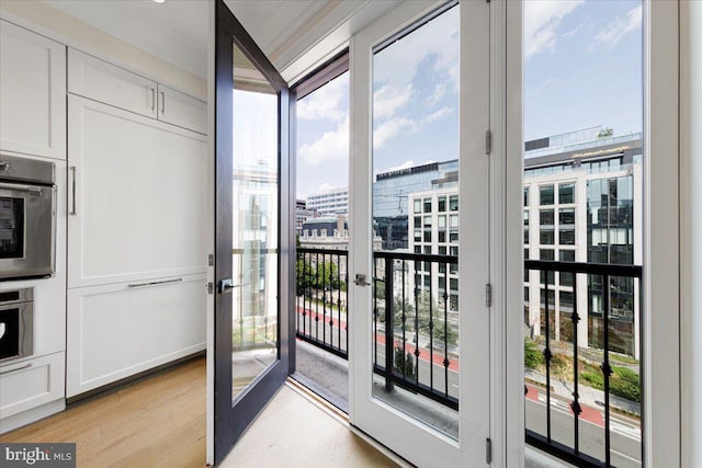 doorway to outside featuring light hardwood / wood-style flooring