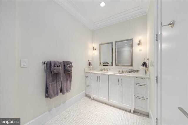 bathroom featuring ornamental molding, dual bowl vanity, and tile patterned floors