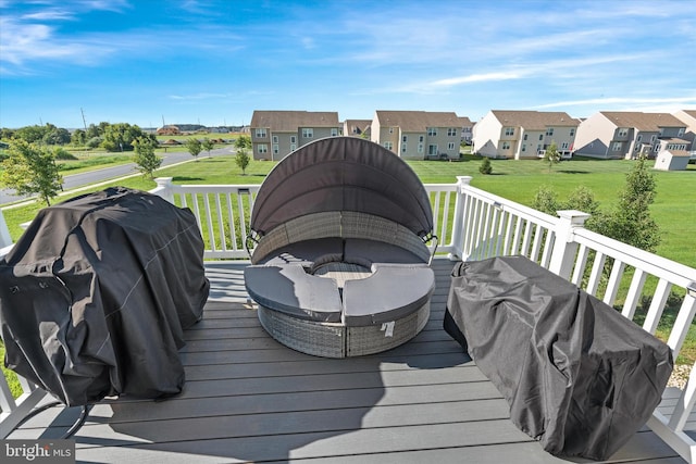 deck featuring a lawn