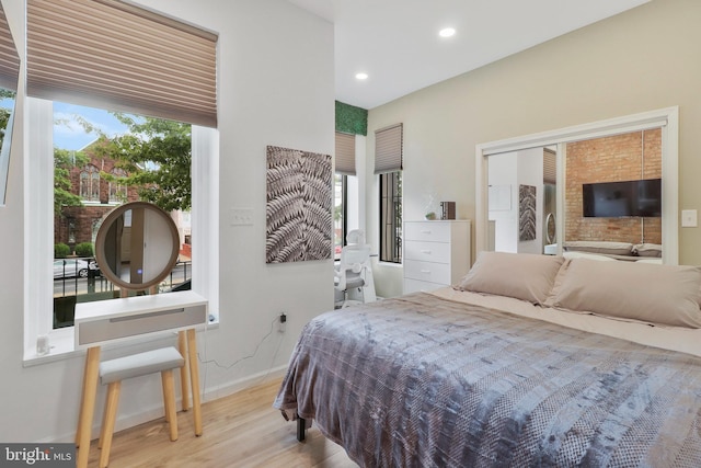 bedroom with light wood-type flooring