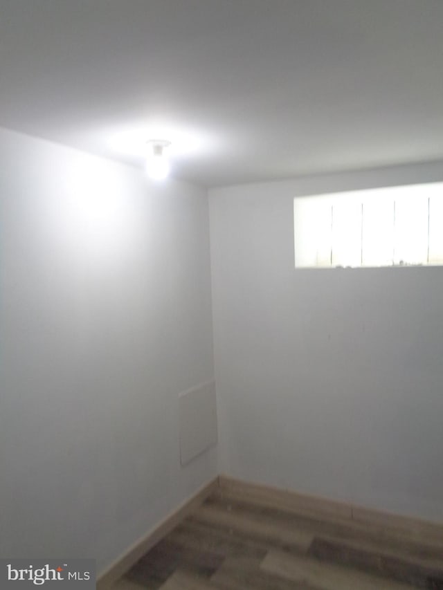 unfurnished room featuring hardwood / wood-style floors