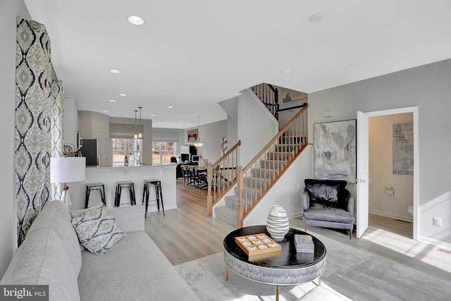 living room featuring light wood-type flooring