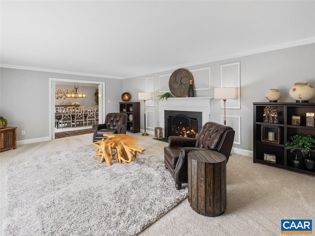 living room featuring a notable chandelier, light carpet, and ornamental molding