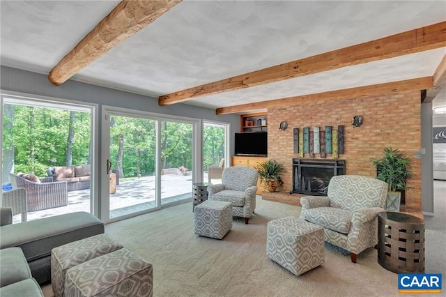 living room featuring carpet and beamed ceiling