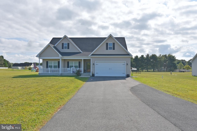 craftsman-style home featuring a front lawn, covered porch, and a garage