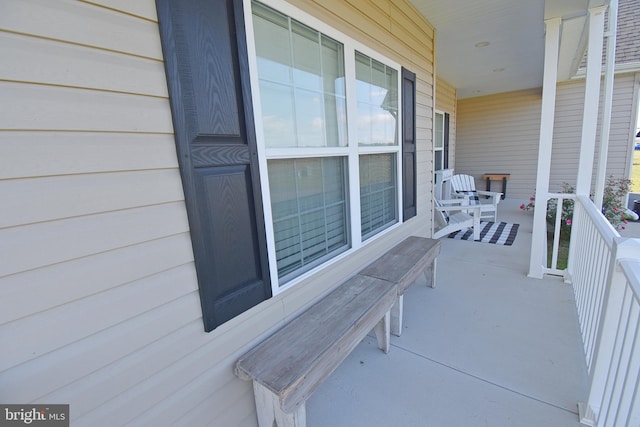 balcony featuring a porch