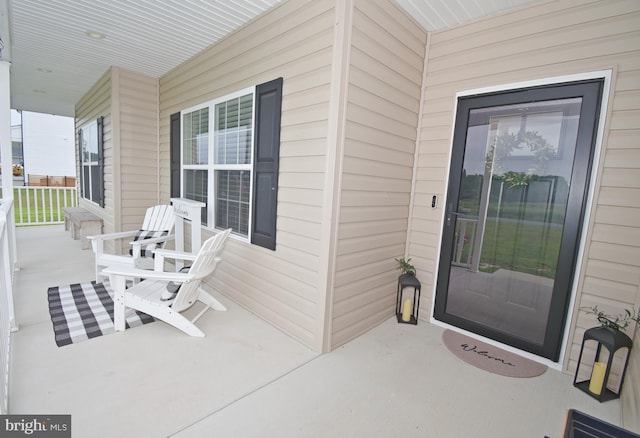 property entrance with a porch