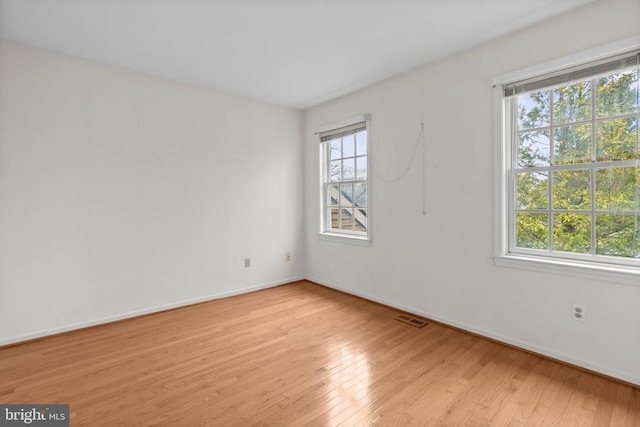 empty room featuring light hardwood / wood-style floors