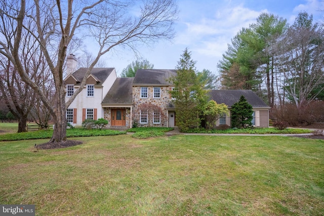 view of front of house with a front yard