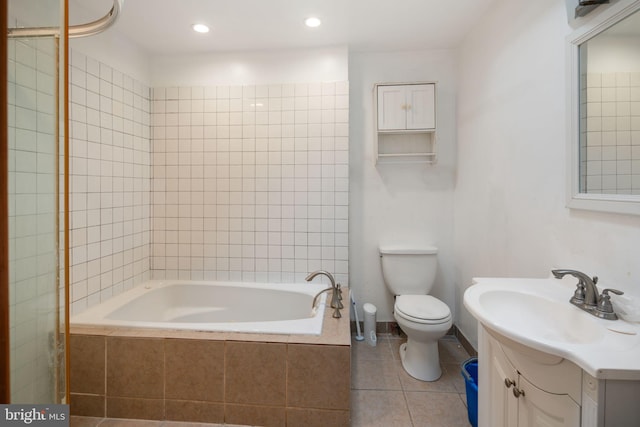 full bathroom featuring shower with separate bathtub, tile patterned flooring, vanity, and toilet