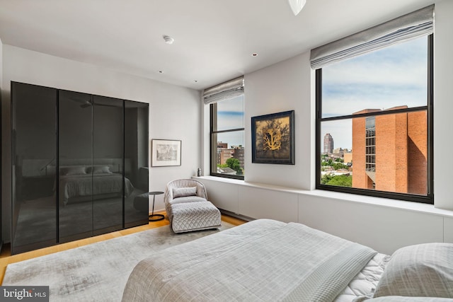 bedroom with light hardwood / wood-style floors