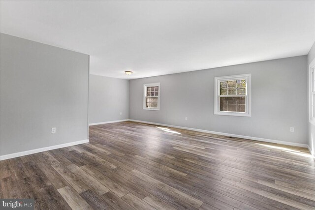 unfurnished room featuring wood-type flooring