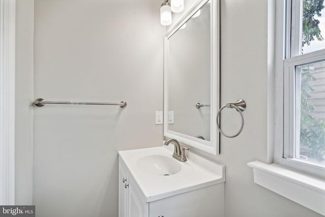 bathroom featuring vanity and a wealth of natural light