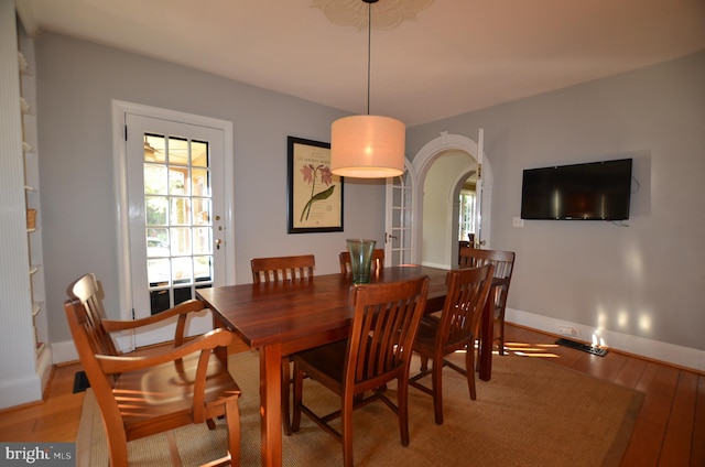 dining space featuring light hardwood / wood-style floors