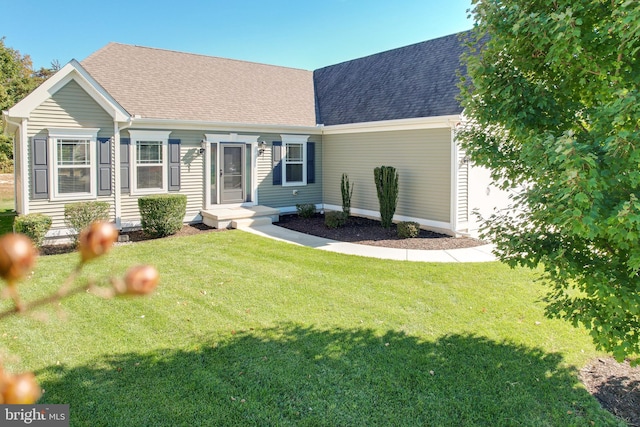 view of front facade with a front lawn