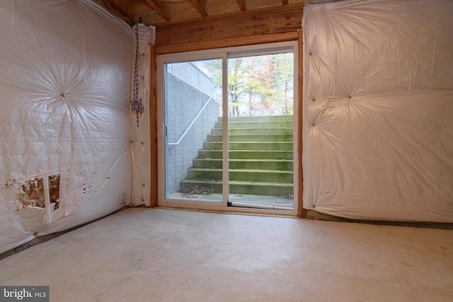 doorway with concrete flooring