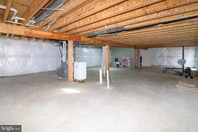 basement featuring heating unit