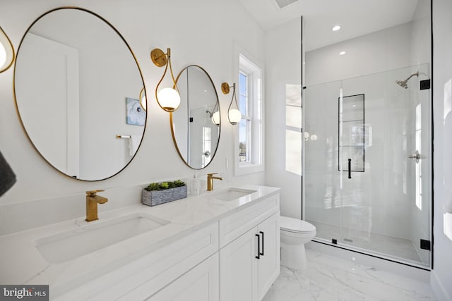 bathroom featuring double sink vanity, walk in shower, tile patterned floors, and toilet