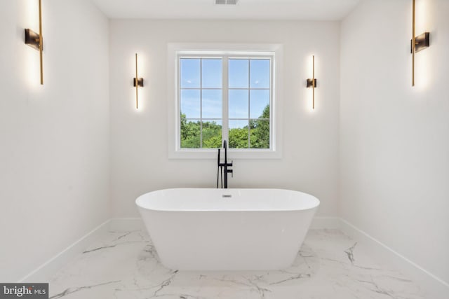 bathroom with tile patterned floors