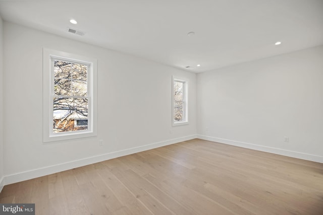 empty room with light wood-type flooring