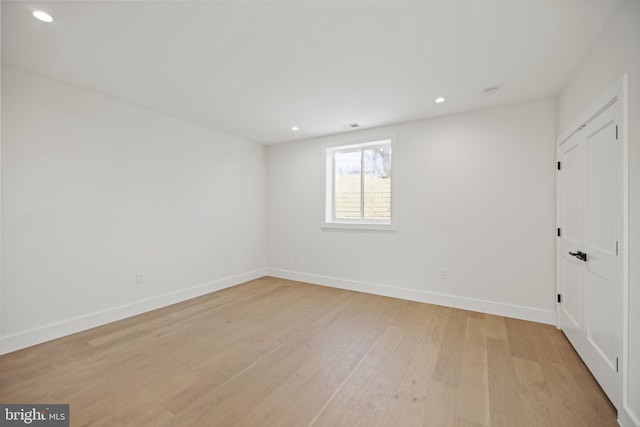 empty room featuring light hardwood / wood-style floors