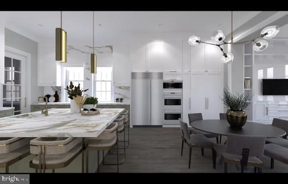 dining space featuring wood finished floors