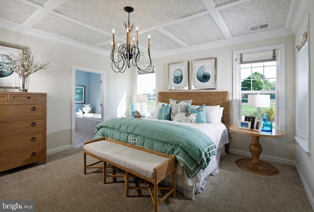 bedroom with connected bathroom, coffered ceiling, multiple windows, and an inviting chandelier