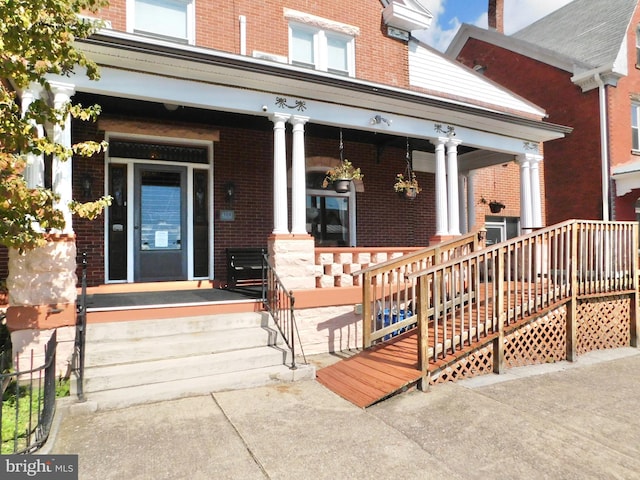 entrance to property with a porch