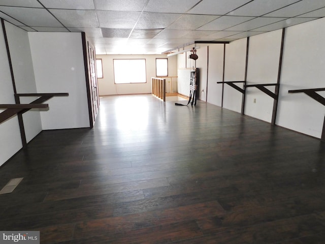 basement with hardwood / wood-style flooring