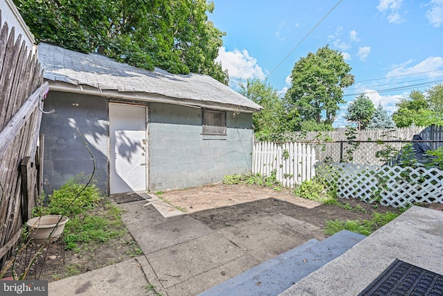 view of side of home featuring a patio