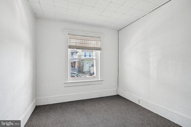 unfurnished room featuring carpet flooring