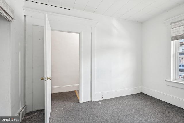 unfurnished bedroom with carpet