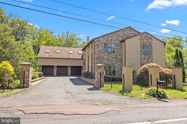 front of property featuring a garage