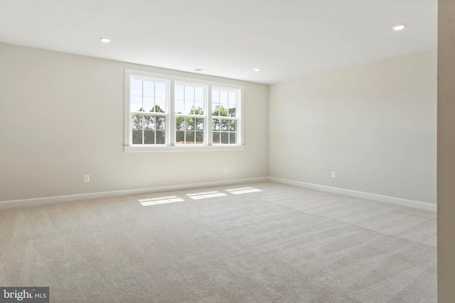 view of carpeted spare room