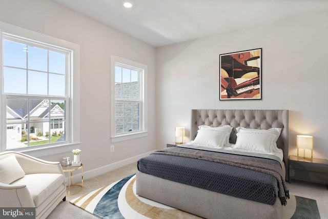 bedroom featuring light carpet