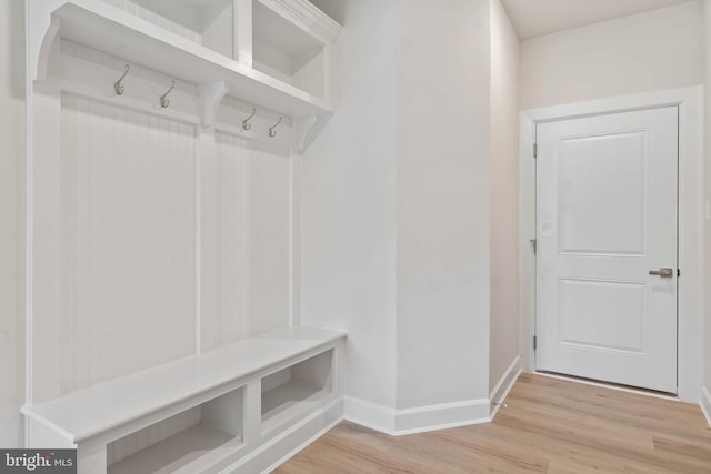 mudroom with hardwood / wood-style flooring