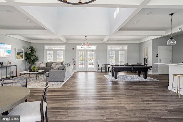 playroom featuring french doors, dark hardwood / wood-style floors, and coffered ceiling