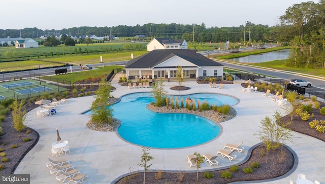 view of pool featuring a patio area