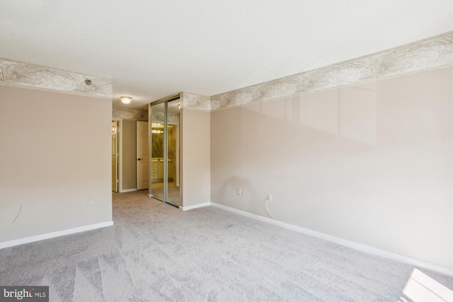 unfurnished room with carpet floors