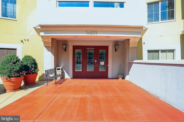 property entrance featuring french doors