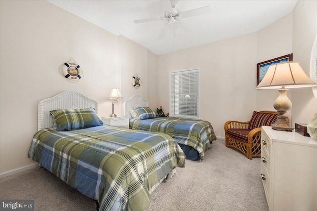 bedroom with light colored carpet and ceiling fan