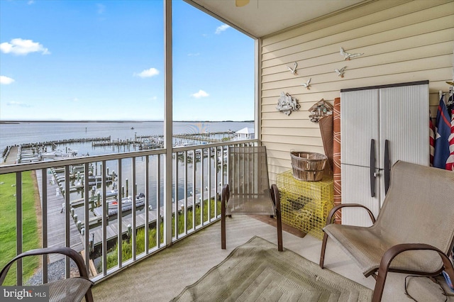 balcony featuring a water view